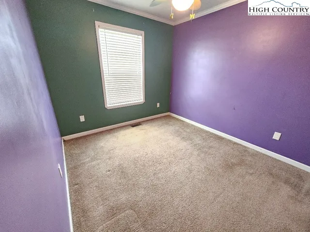 a bathroom with a sink double vanity and a mirror