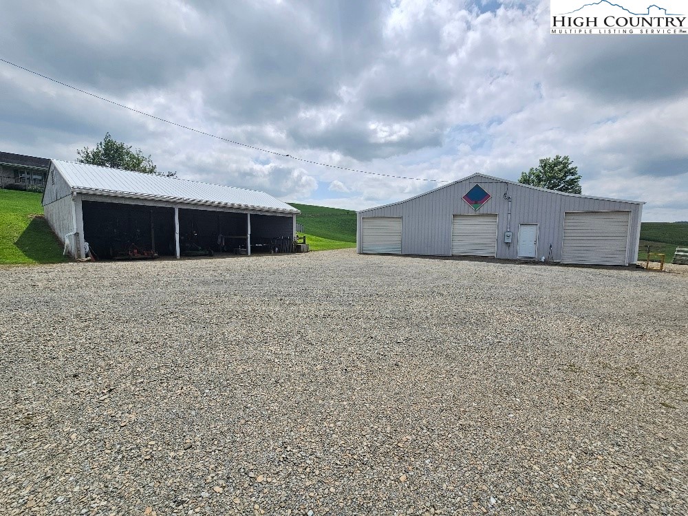 459 Edwards Road Ennice, NC 28623 - Photo 22 of 36 a front view of house with yard