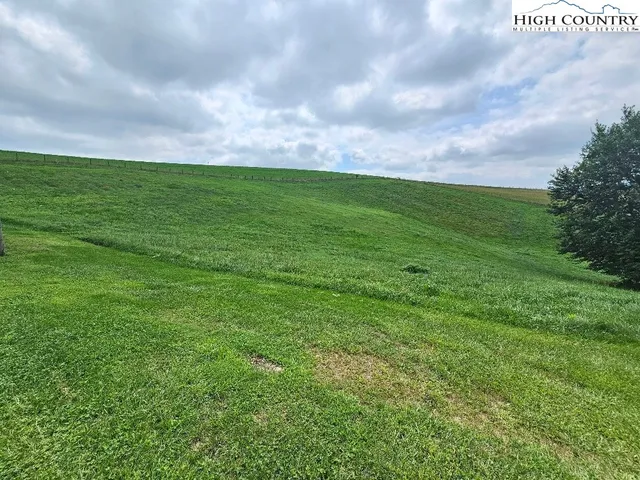 a view of an ocean and mountain
