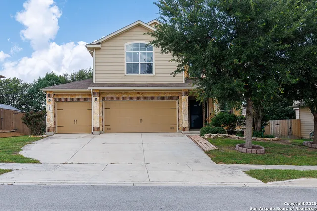 front view of house with a yard