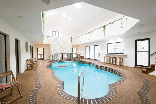 a view of a living room and dining room