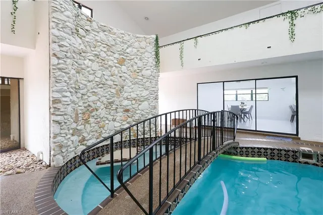 a view of a porch with wooden floor