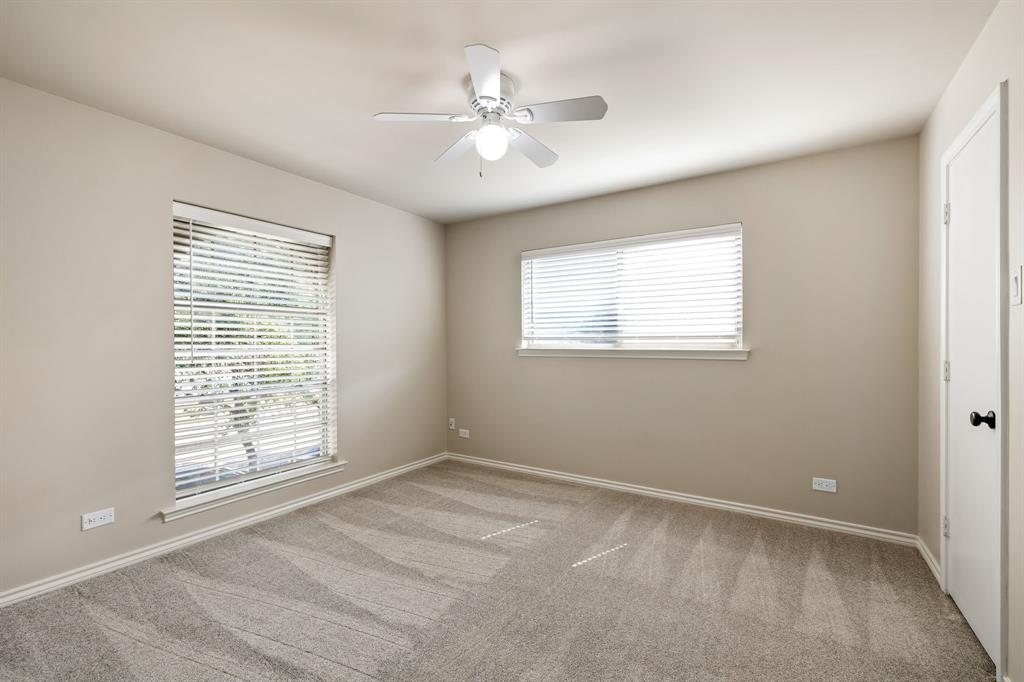 5921 Preston Road University Park, TX 75205 - Photo 14 of 37 a view of an empty room with a window