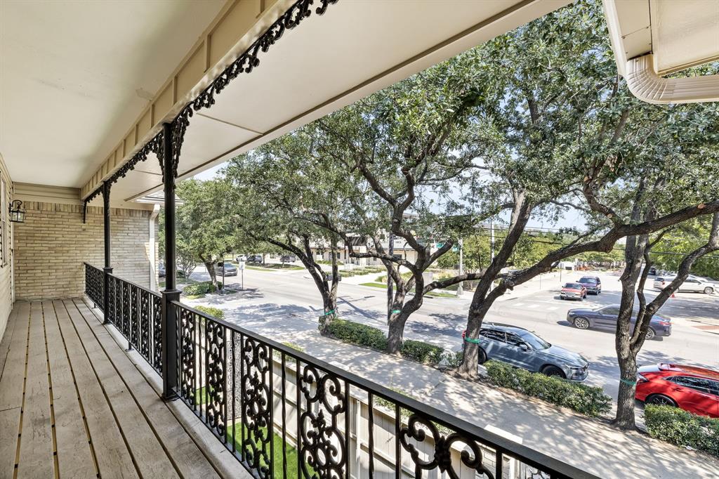 5921 Preston Road University Park, TX 75205 - Photo 25 of 37 a view of a balcony with wooden stairs
