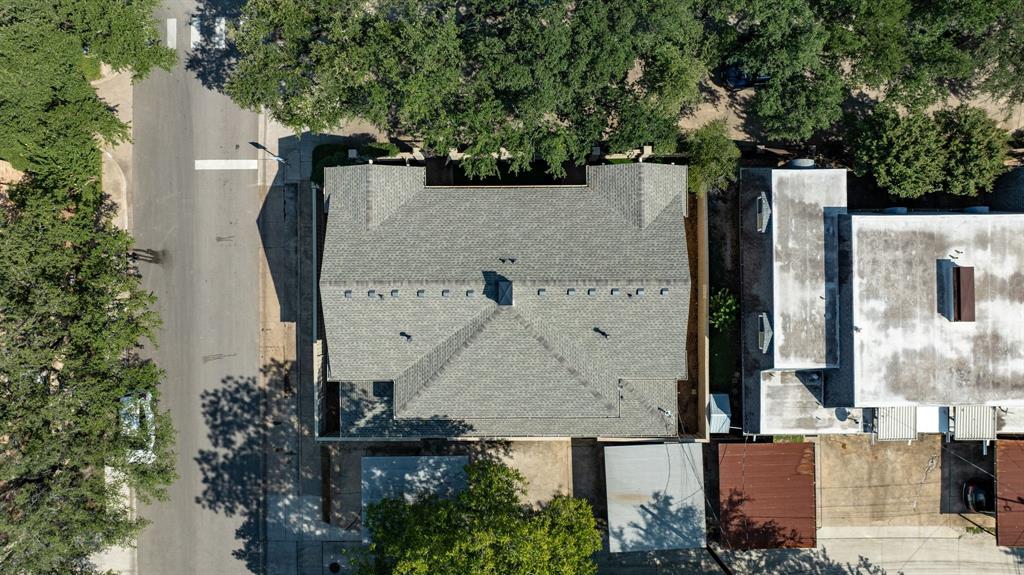 5921 Preston Road University Park, TX 75205 - Photo 29 of 37 an aerial view of a house with a yard and large trees