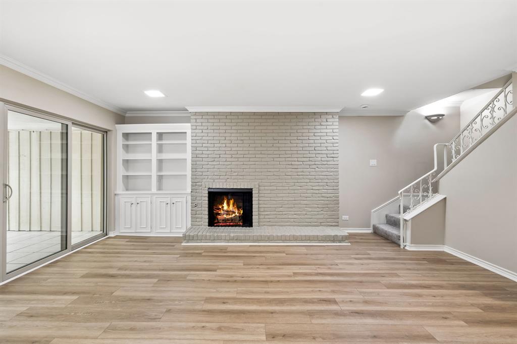 5921 Preston Road University Park, TX 75205 - Photo 5 of 37 a view of a livingroom with wooden floor