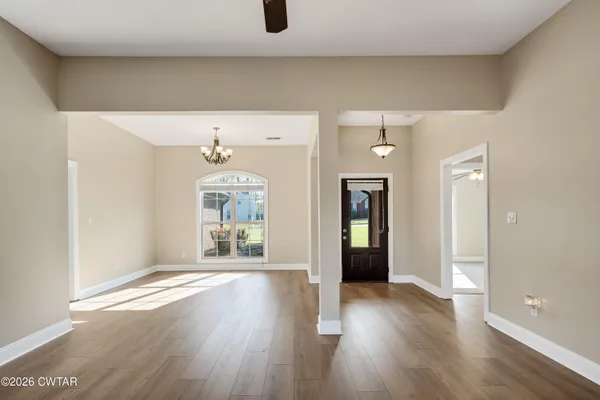 a front view of a house with wooden floor