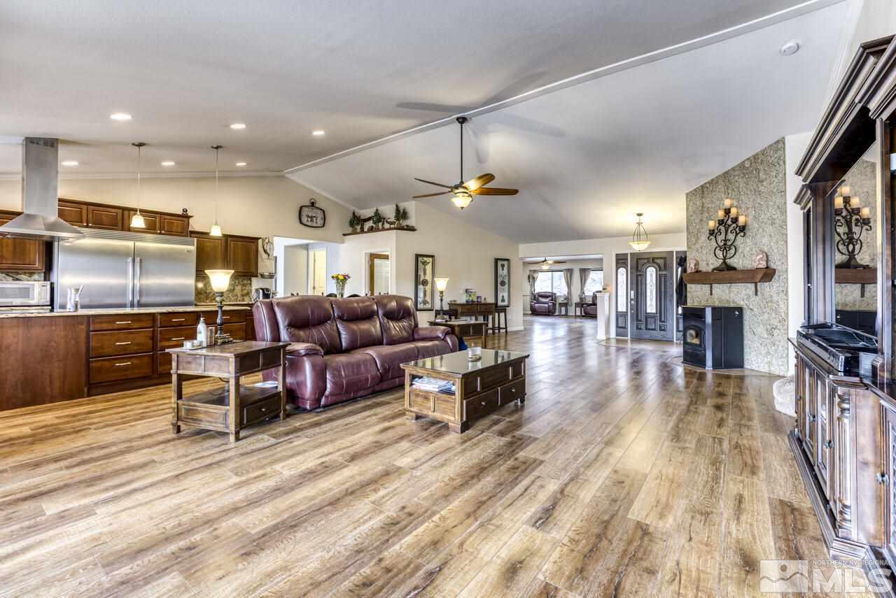 2330 Enterprise Road Reno, NV 89521 - Photo 35 of 40 a living room with lots of furniture and kitchen view