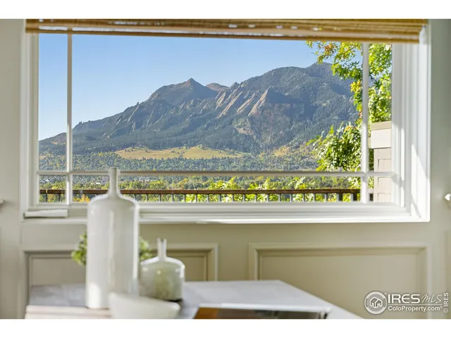 a picture of a table and chair in a balcony