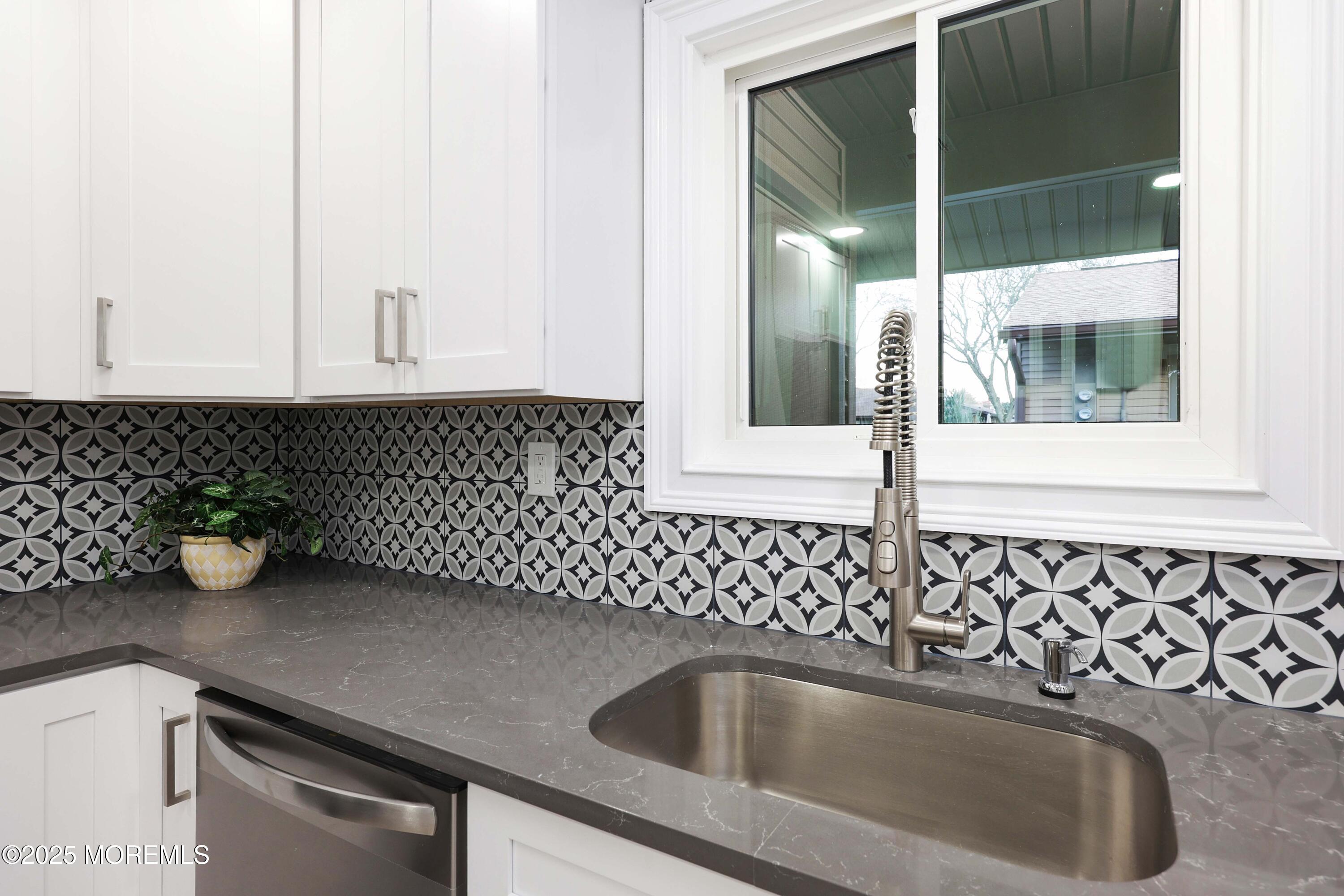 12 Ellsworth Court Red Bank, NJ 07701 - Photo 8 of 54 a kitchen with a sink and cabinets