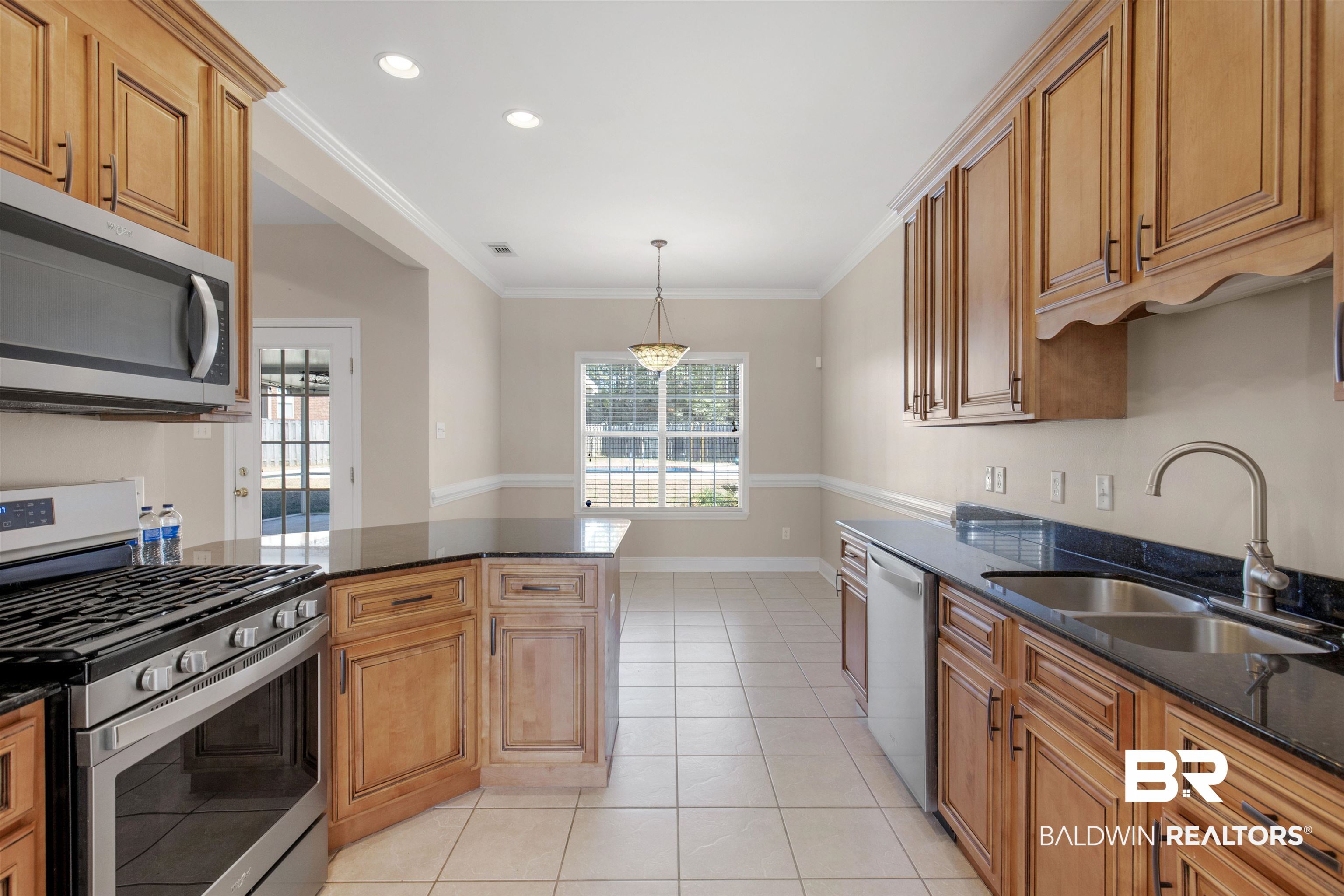 330 Allison Court Mobile, AL 36608 - Photo 10 of 27 Kitchen featuring appliances with stainless steel finishes, decorative light fixtures, sink, and a wealth of natural light