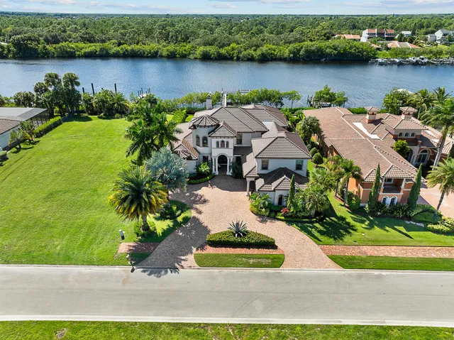 a stove top oven sitting inside of a kitchen