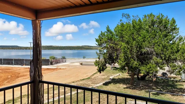 a living room with furniture fireplace and flat screen tv