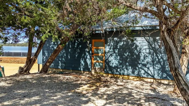 a living room with furniture fireplace and a flat screen tv