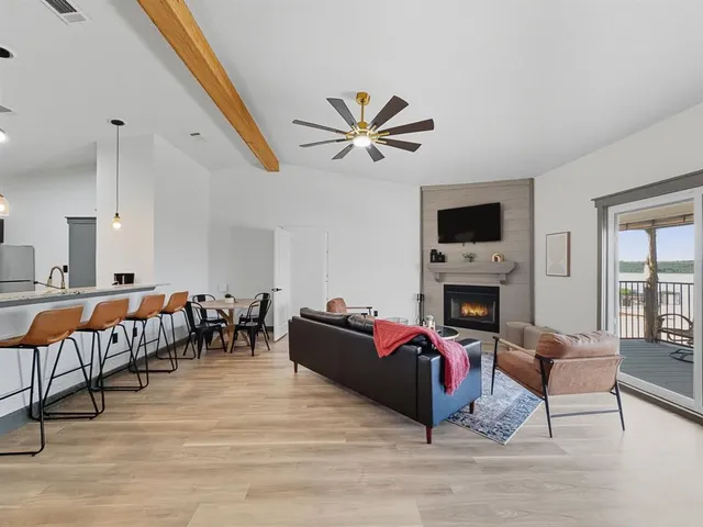 a bedroom with two beds and a window