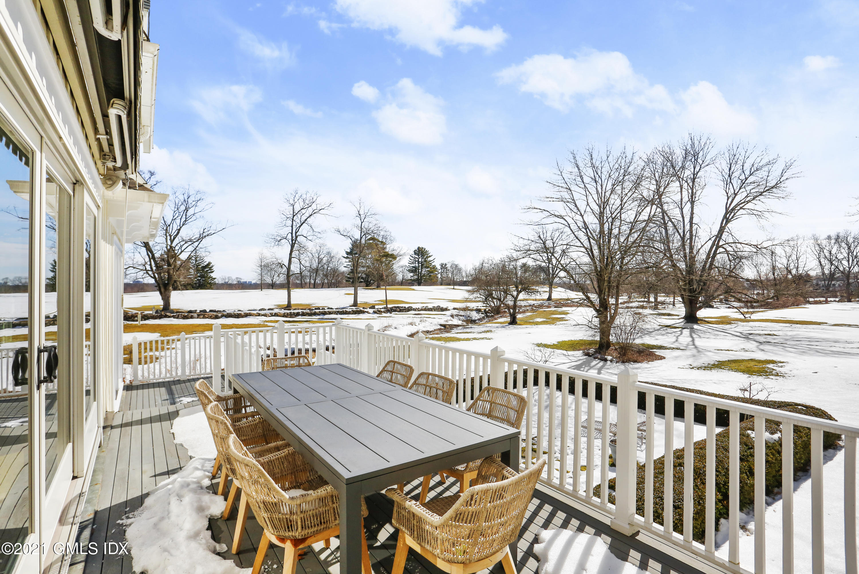 6 Golf Club Road Greenwich, CT 06830 - Photo 24 of 29 a view of a patio with iron fence