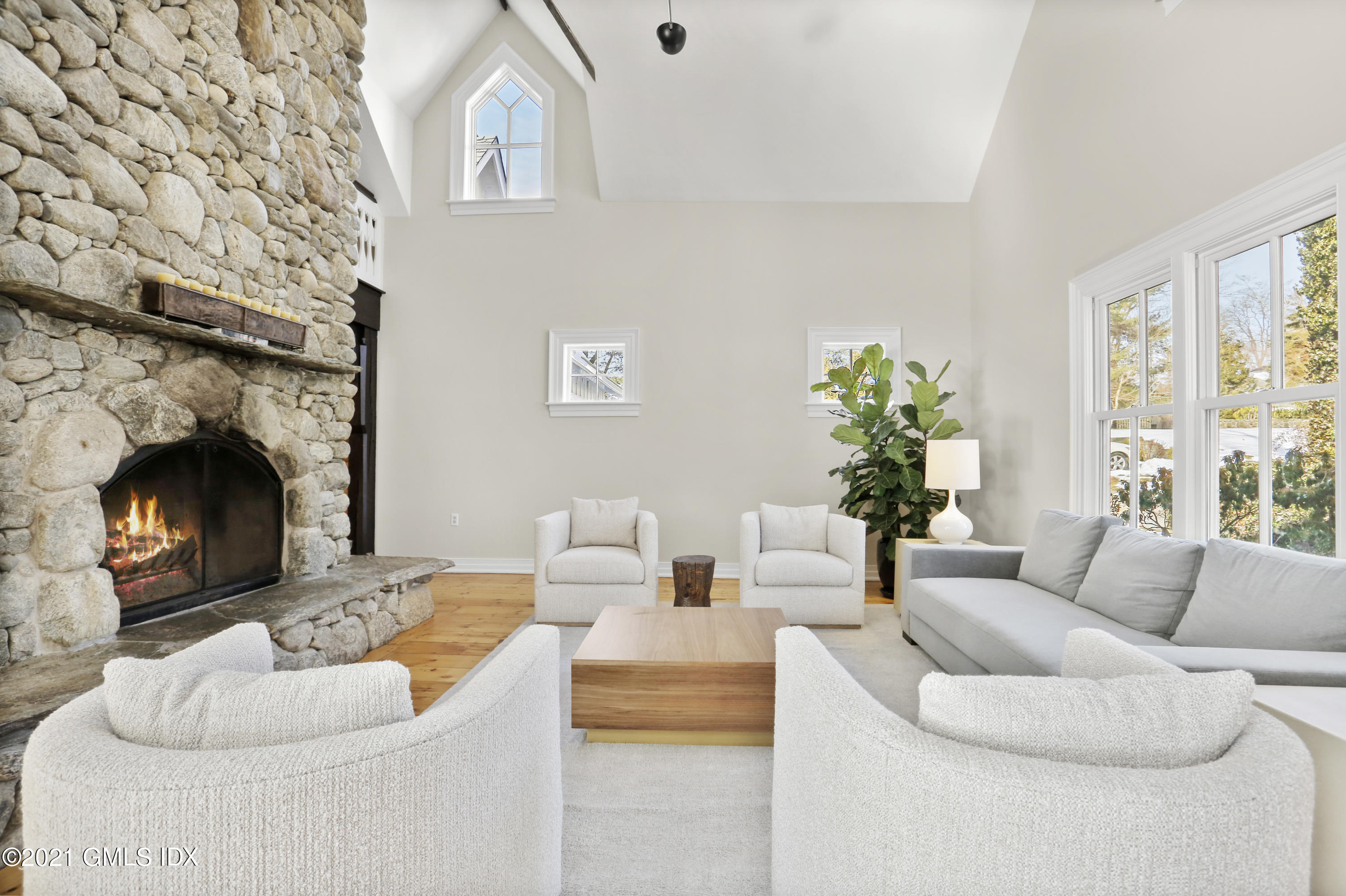 6 Golf Club Road Greenwich, CT 06830 - Photo 4 of 29 a living room with furniture and a fireplace