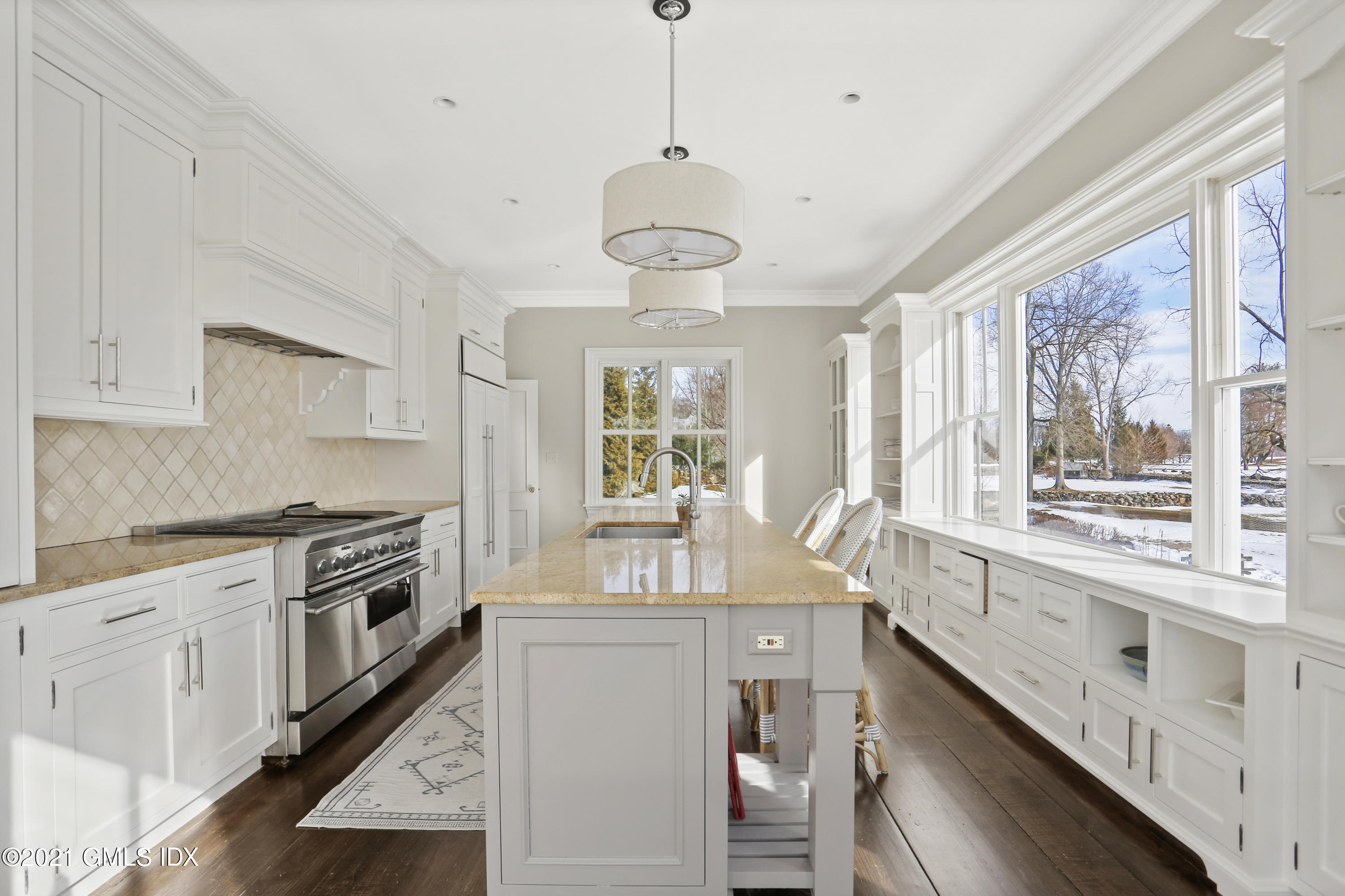 6 Golf Club Road Greenwich, CT 06830 - Photo 9 of 29 a kitchen with stainless steel appliances granite countertop a stove and a sink