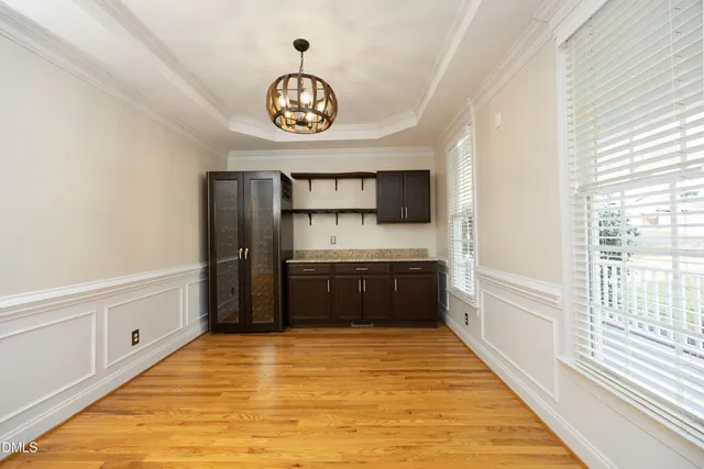 a kitchen with stainless steel appliances a refrigerator and a stove