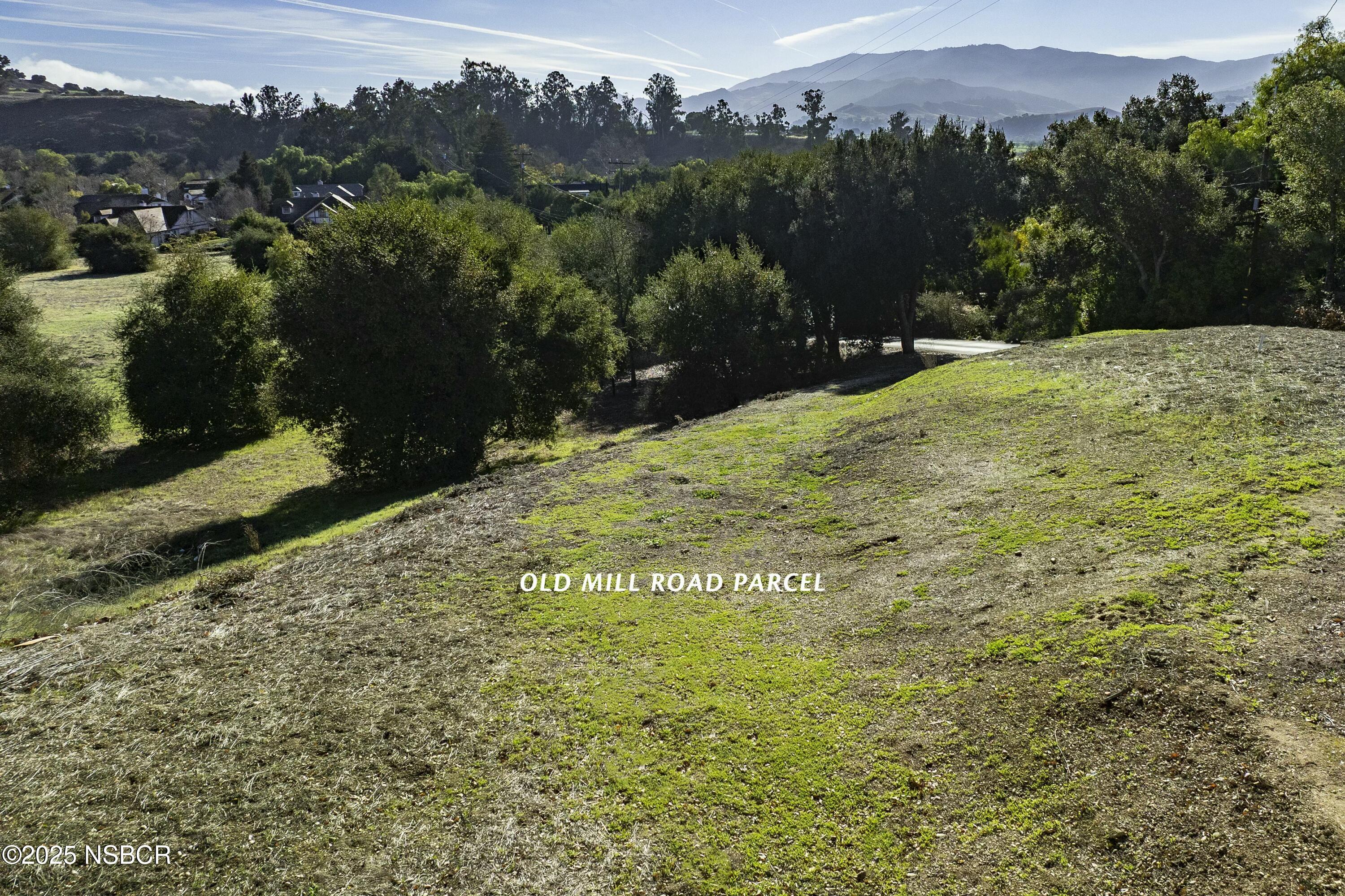 Old Mill Road Solvang, CA 93463 - Photo 12 of 14 a view of a field with a tree in the background
