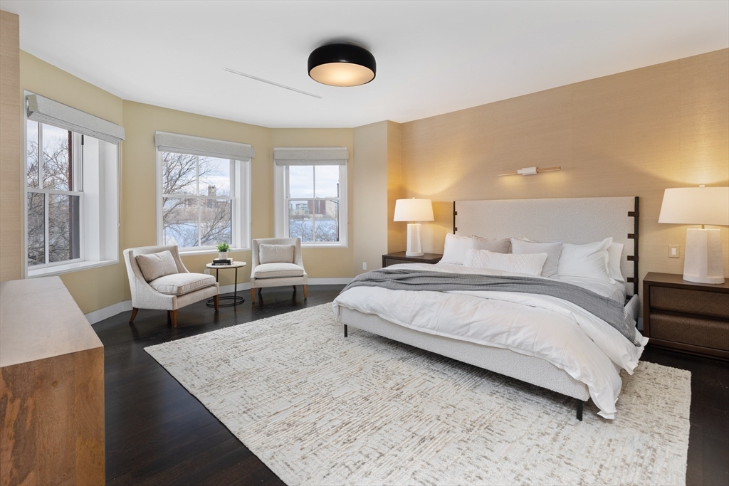 410 Beacon Street Boston, MA 02115 - Photo 13 of 35 a bedroom with a large bed and a couch