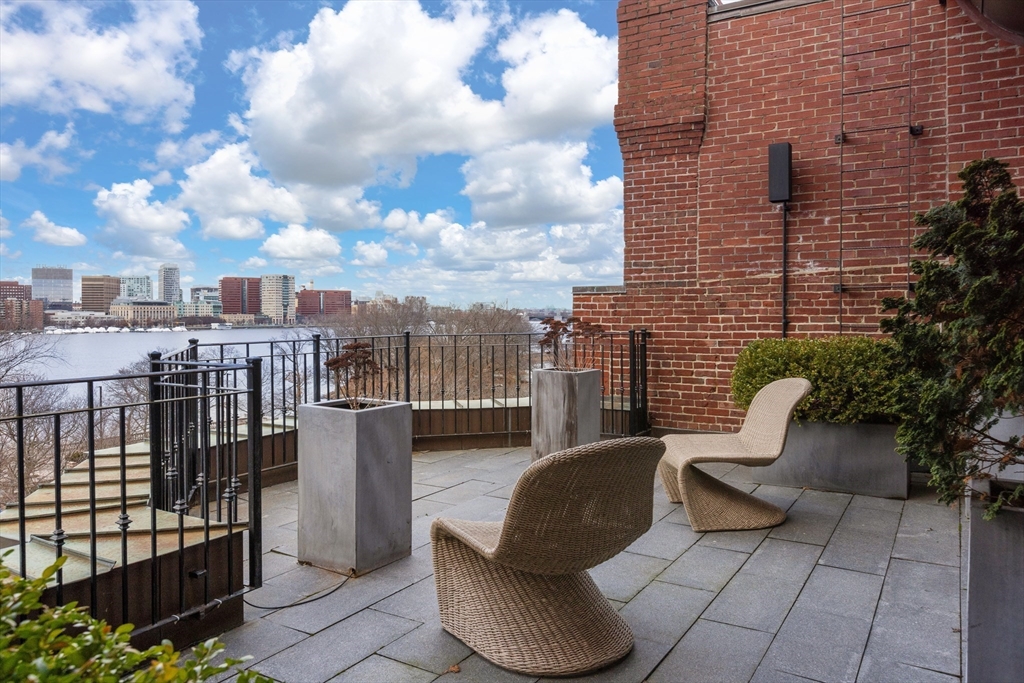 410 Beacon Street Boston, MA 02115 - Photo 26 of 35 a view of a patio with couches and a potted plant