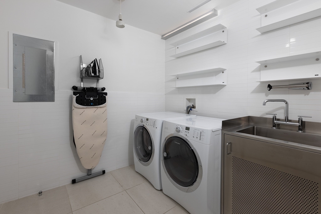410 Beacon Street Boston, MA 02115 - Photo 34 of 35 a utility room with dryer and washer