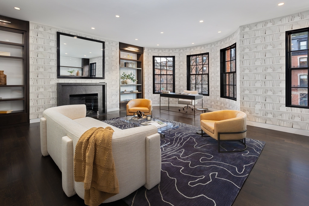 410 Beacon Street Boston, MA 02115 - Photo 6 of 35 a living room with furniture and a table