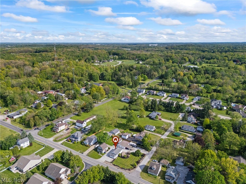 258 Randolph Road Mogadore, OH 44260 - Photo 47 of 49 Aerial perspective showcasing a residential area with mature trees and green spaces