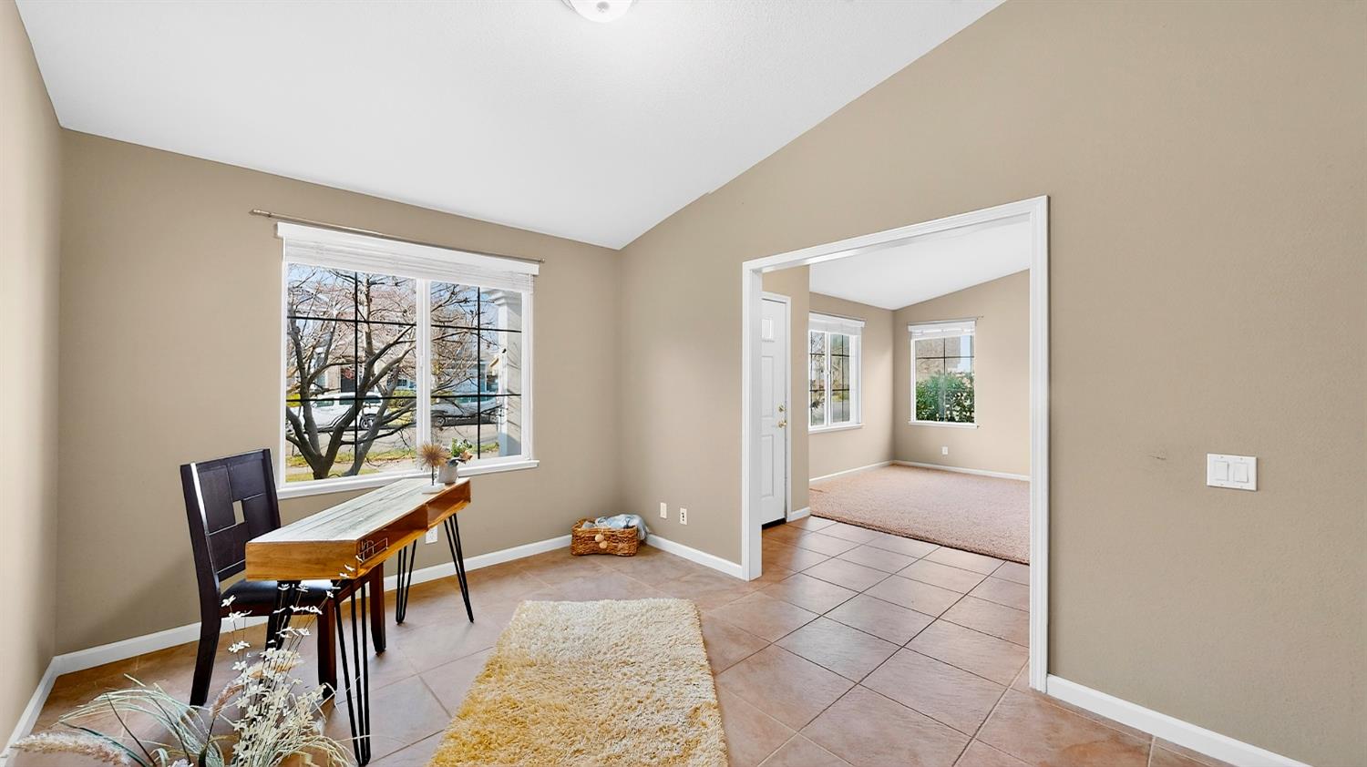 4102 Windrose Drive Turlock, CA 95382 - Photo 12 of 45 a view of a livingroom with furniture and a window