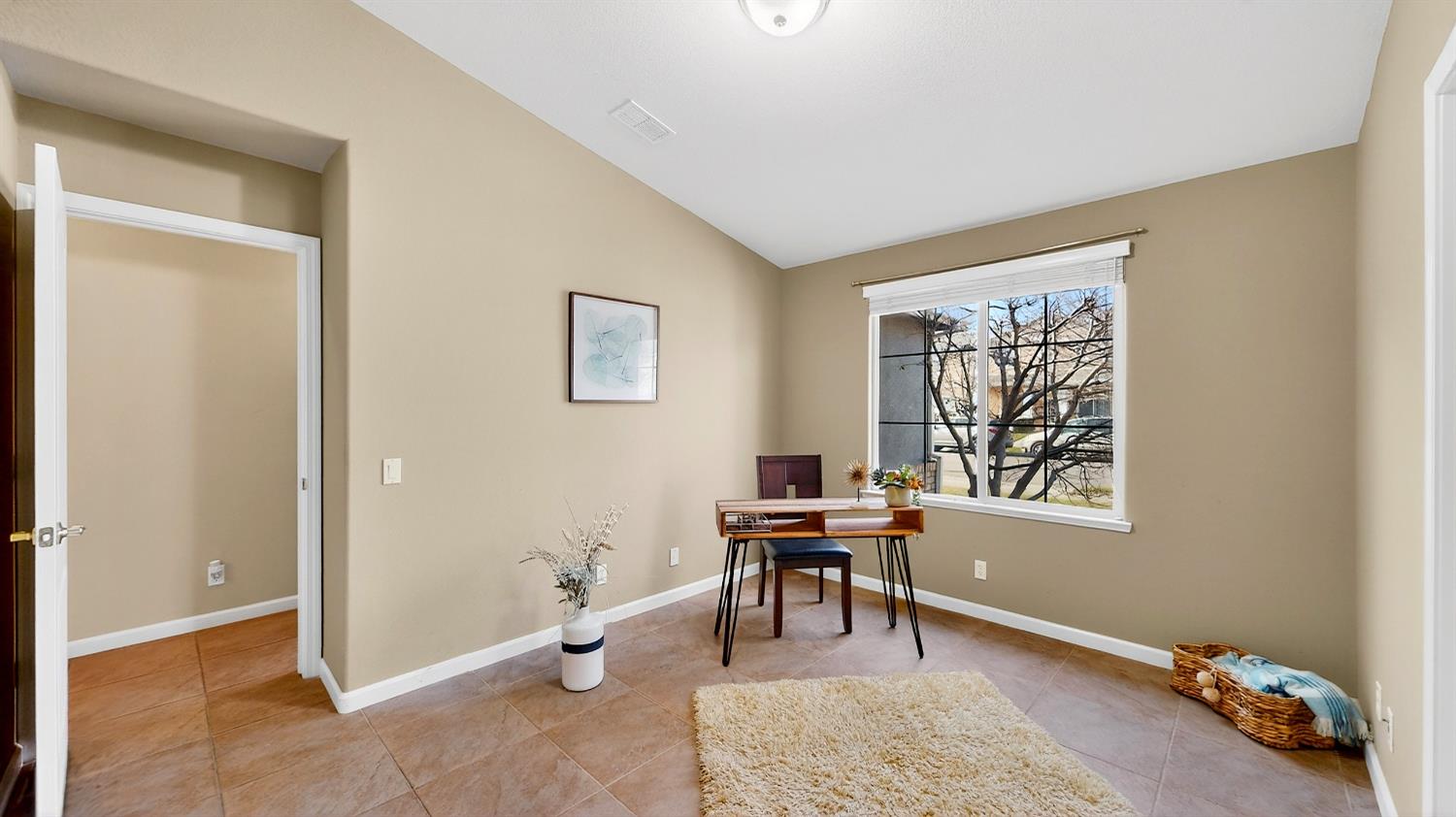 4102 Windrose Drive Turlock, CA 95382 - Photo 13 of 45 a livingroom with workspace and a window