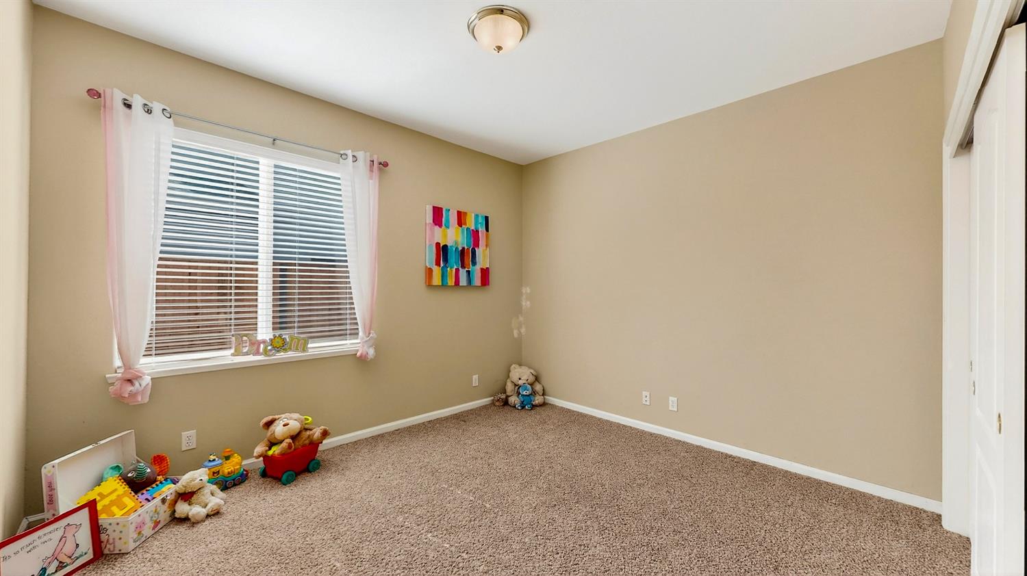 4102 Windrose Drive Turlock, CA 95382 - Photo 23 of 45 a view of livingroom with toys