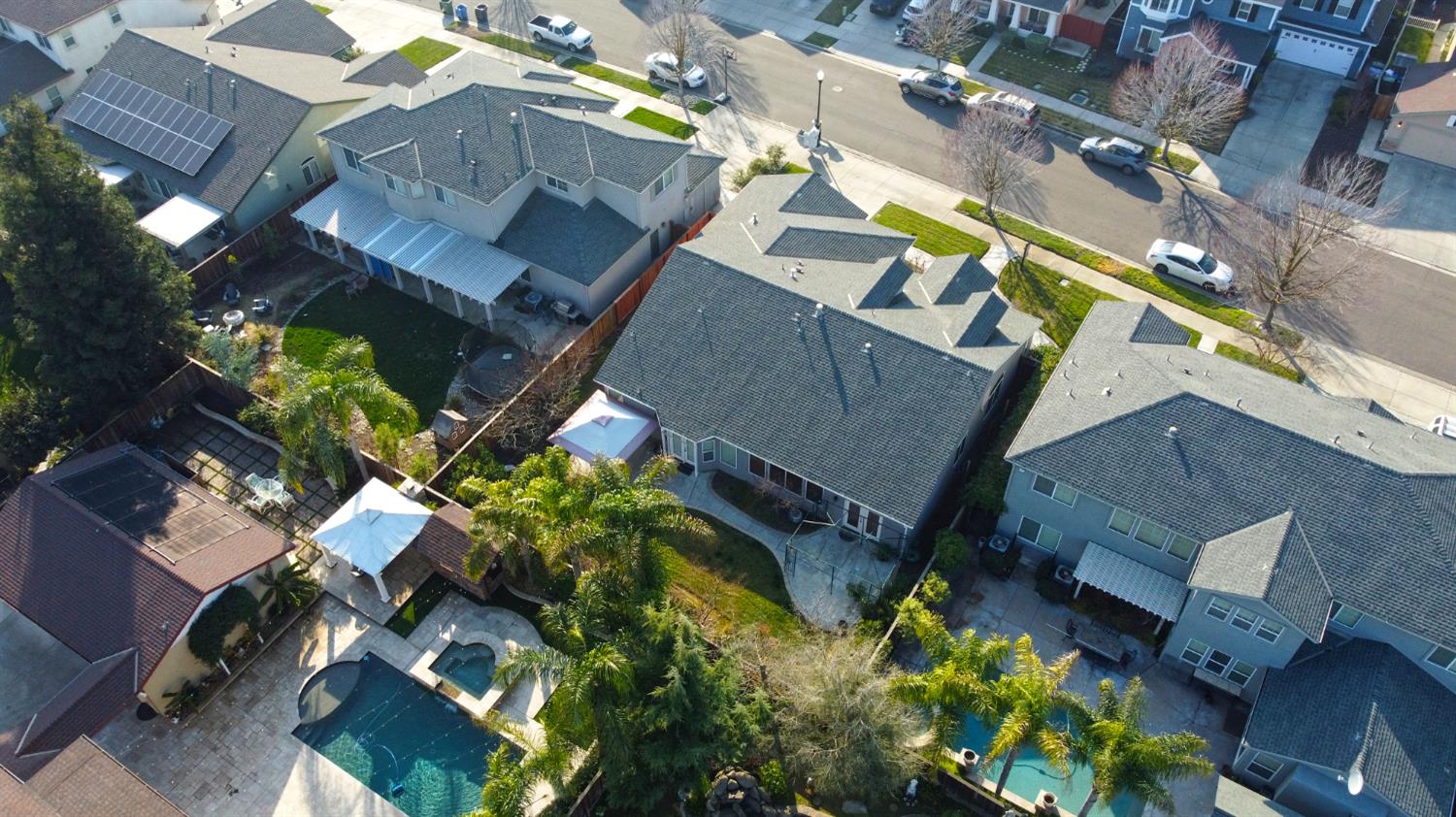 4102 Windrose Drive Turlock, CA 95382 - Photo 36 of 45 an aerial view of a residential apartment building with a yard