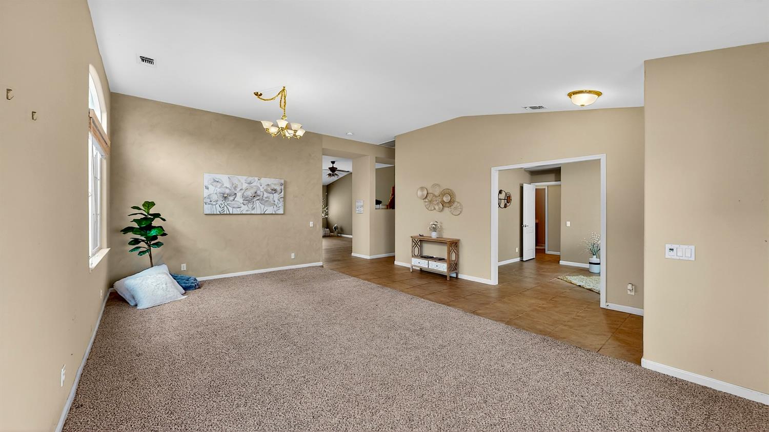 4102 Windrose Drive Turlock, CA 95382 - Photo 7 of 45 a view of livingroom with furniture and chandelier fan