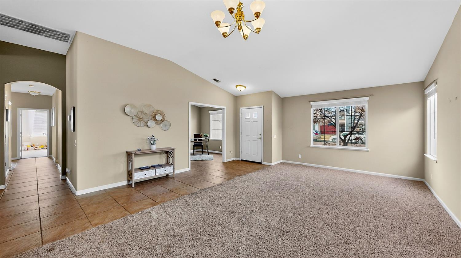 4102 Windrose Drive Turlock, CA 95382 - Photo 9 of 45 an empty room with painting and furniture