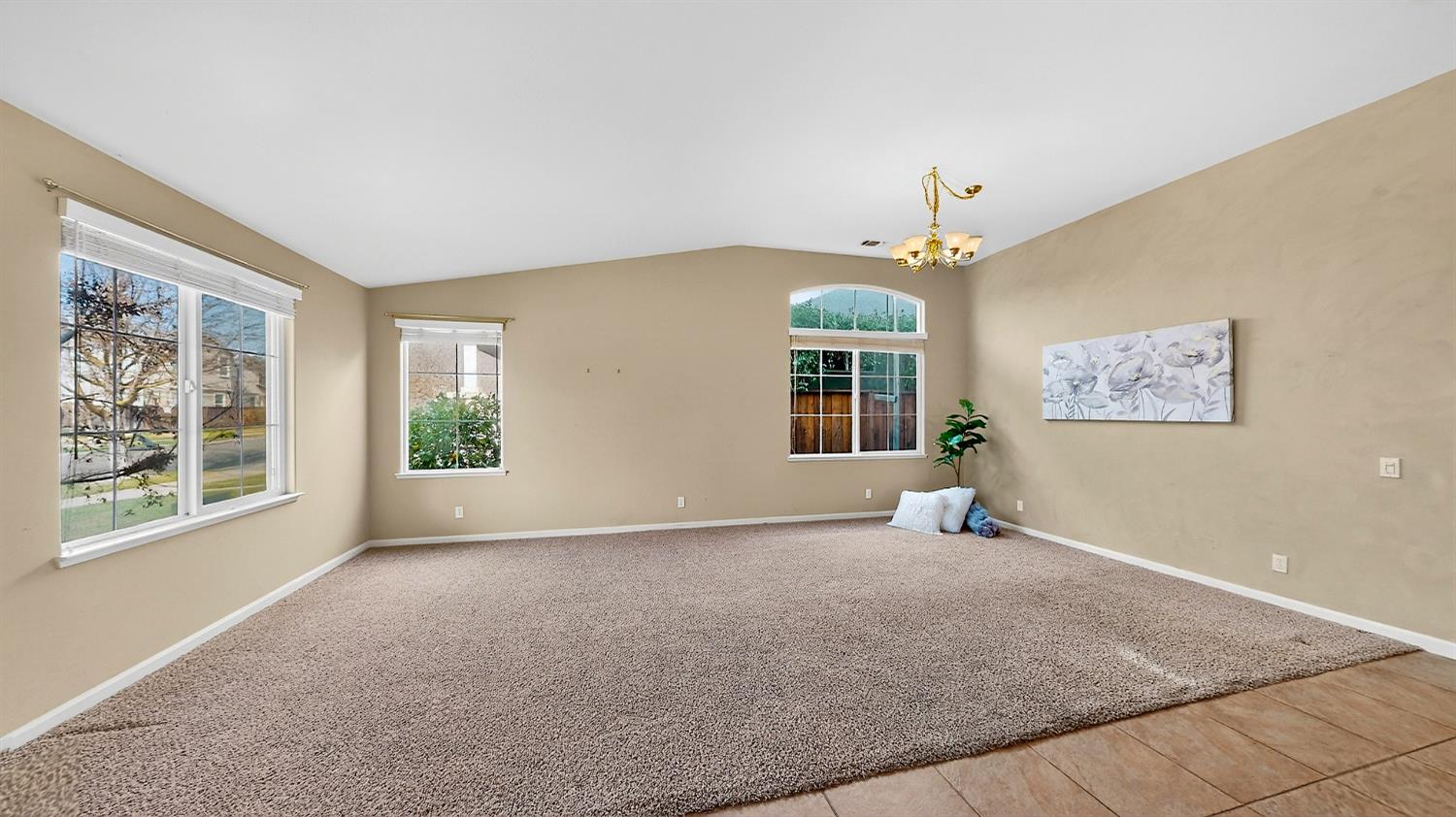 4102 Windrose Drive Turlock, CA 95382 - Photo 10 of 45 a view of an empty room with a window
