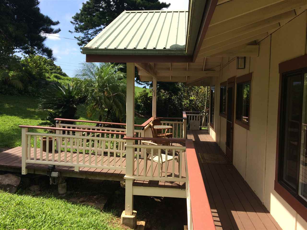 10 Honokaupu Place Haiku, HI 96708 - Photo 22 of 23 a view of balcony with wooden floor and outdoor seating