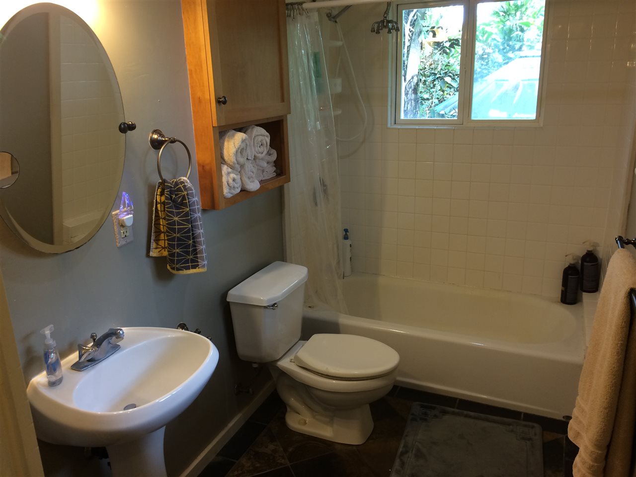 10 Honokaupu Place Haiku, HI 96708 - Photo 7 of 23 a bathroom with a sink a toilet and shower