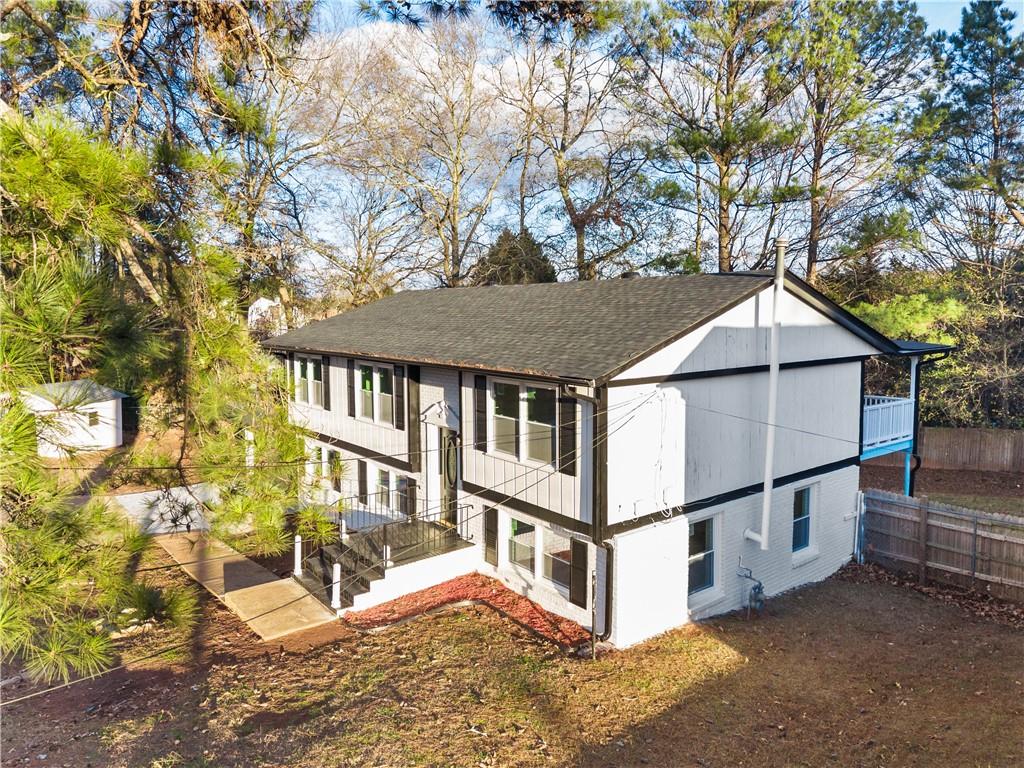2304 South Hairston Road Decatur, GA 30035 - Photo 19 of 24 a view of a house with a yard