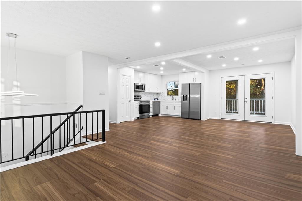 2304 South Hairston Road Decatur, GA 30035 - Photo 3 of 24 a view of a kitchen with a wooden floor
