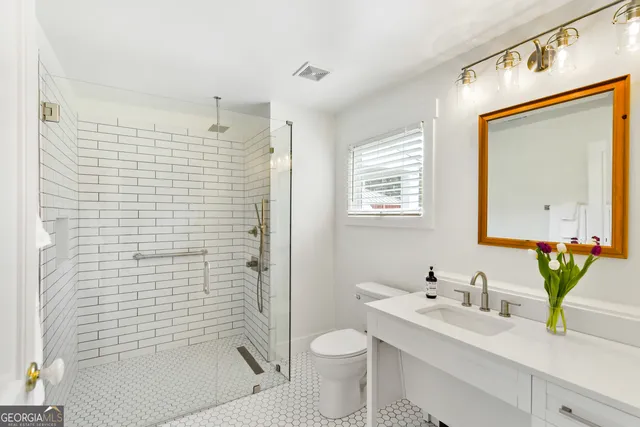 a view of a lake with a yard