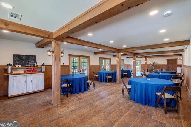 a view of a house with a yard and a garden