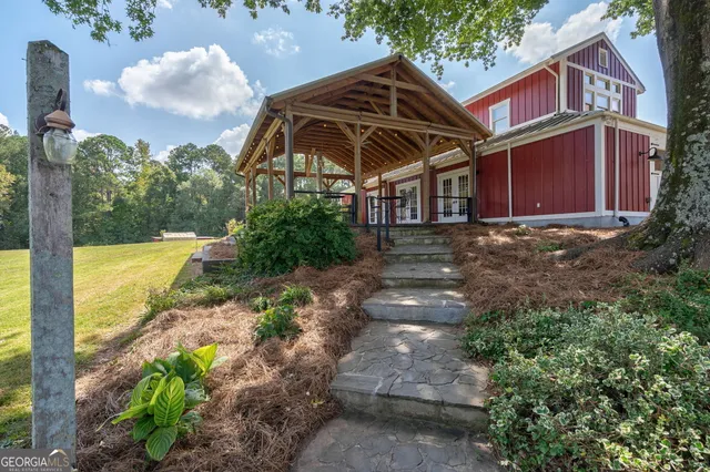 a body of water with a tree in the background