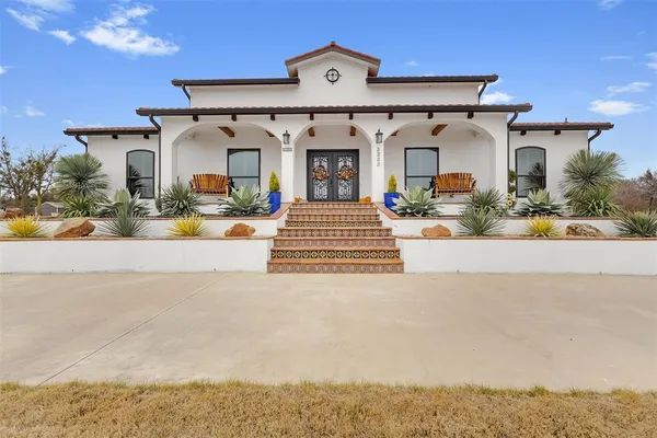 front view of a house with a patio