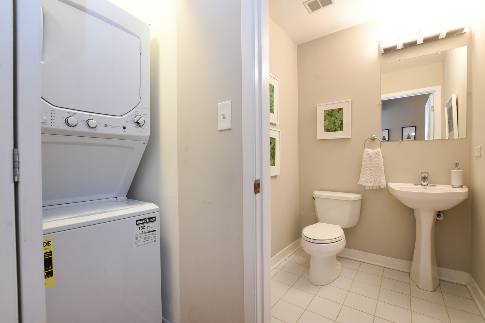 920 West Madison Street, Unit D4 Chicago, IL 60607 - Photo 21 of 34 a bathroom with a sink toilet and a mirror