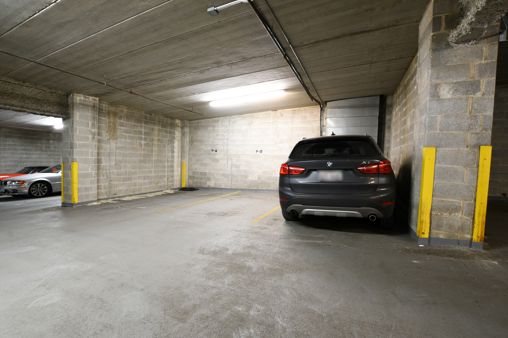 920 West Madison Street, Unit D4 Chicago, IL 60607 - Photo 31 of 34 a car parked in a parking space