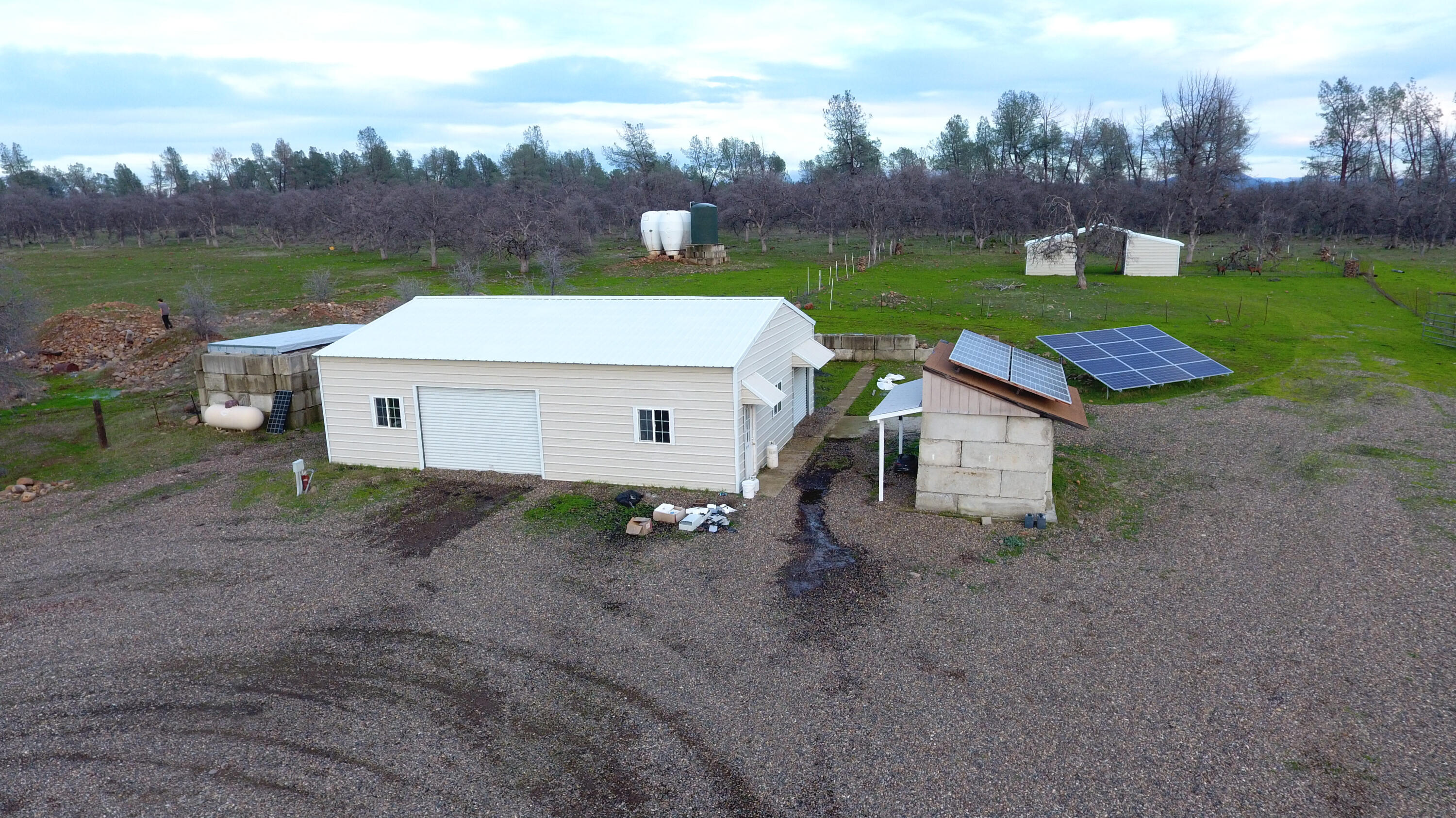 7255 Hyrax Road Shingletown, CA 96088 - Photo 68 of 77 Shop barn water tank generator and pump