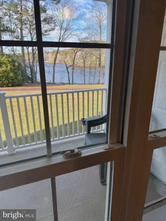 a view of staircase with a window