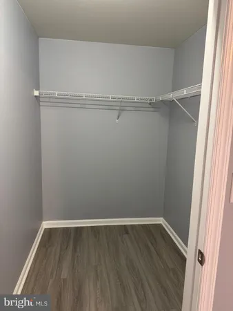 a view of an empty walk in closet