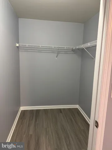 a view of an empty walk in closet